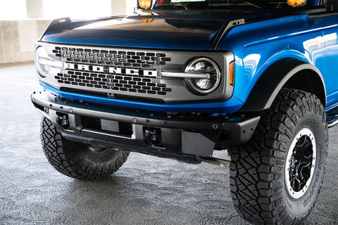 DV8 Offroad LPBR-02 Front license plate relocation bracket places to the side of bumper.